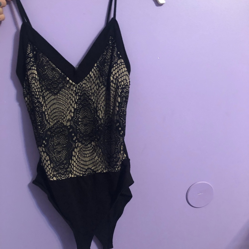 Tans and black lace bodysuit from Charlotte russe